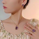 Gold Plated High-End Set of Jewelry Oval Cut Stone Featuring a Simulated Bird's Nest and Dried Roses