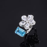 925 Sterling Silver Blue Topaz Emerald Cut Gemstone Open Ring Flower Shape - lanciashow